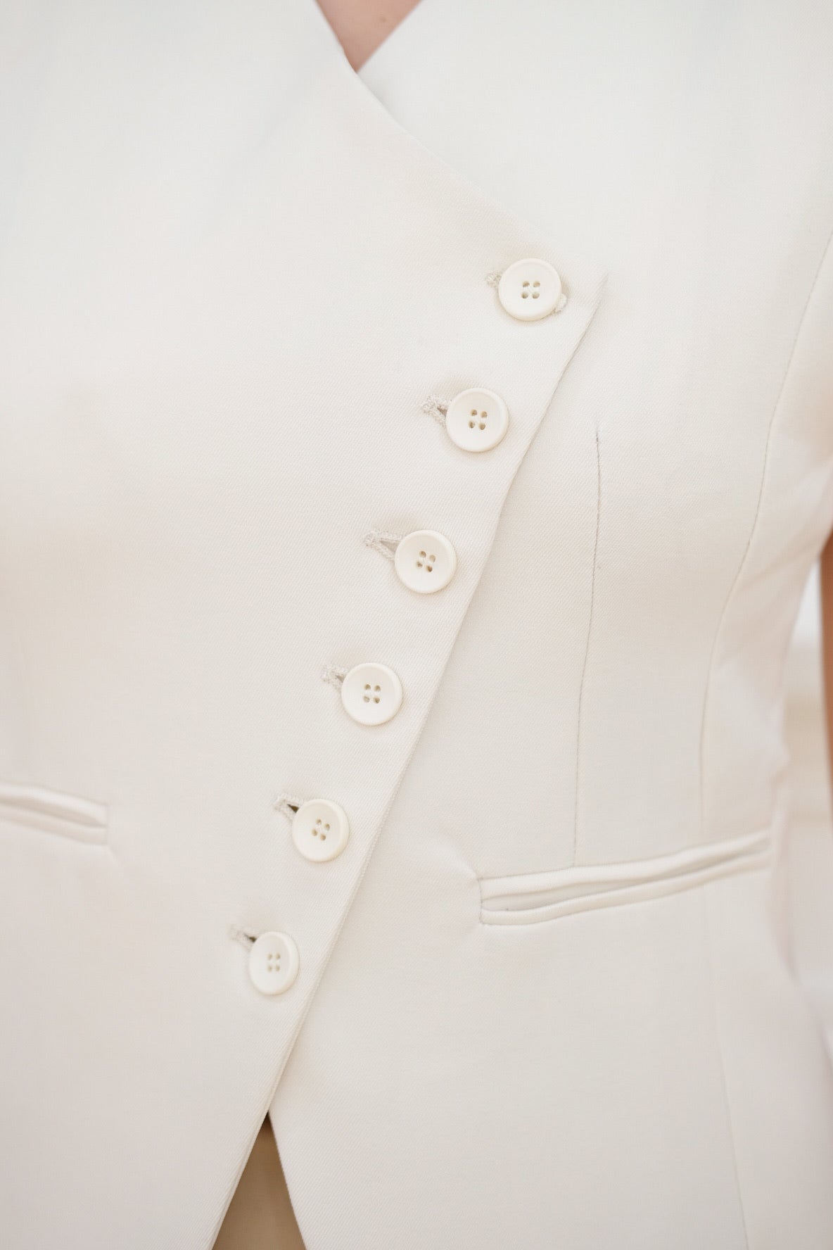White Cropped Asymmetrical Button Vest Top