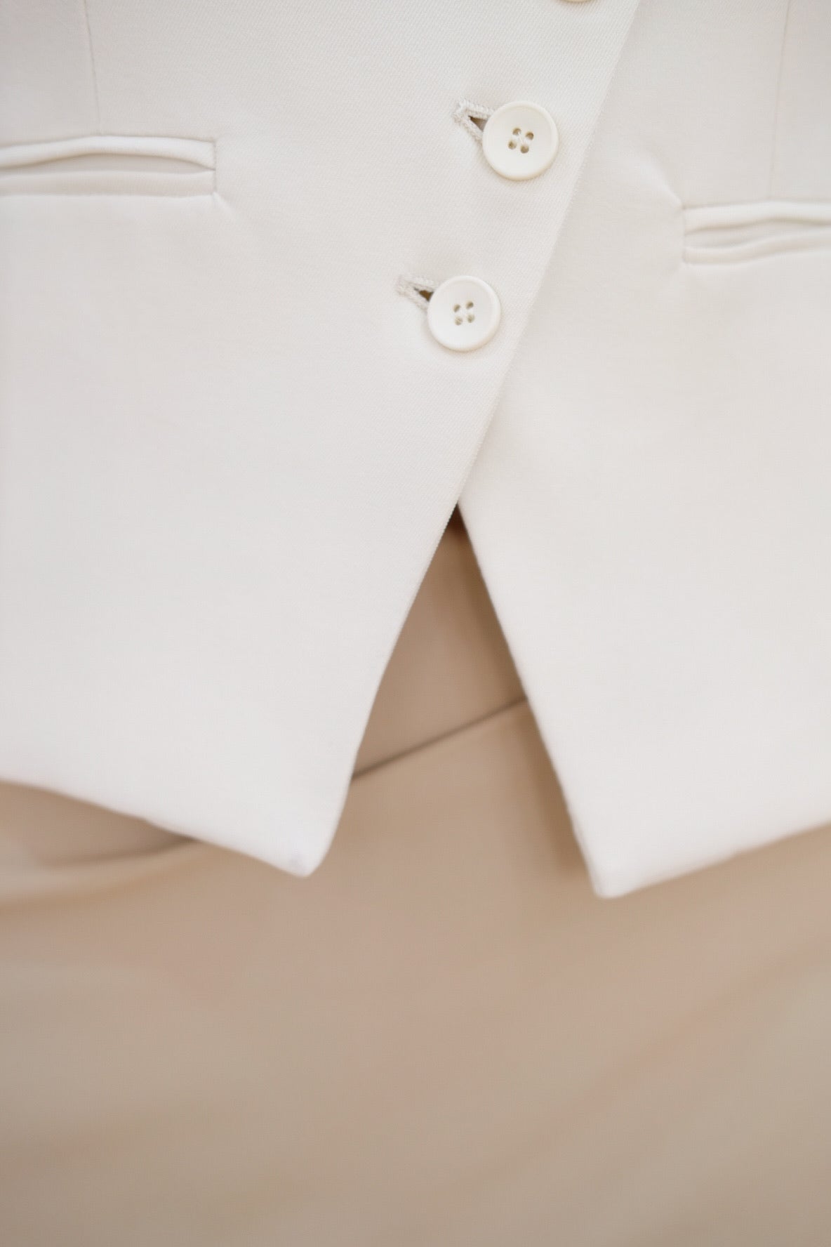 White Cropped Asymmetrical Button Vest Top